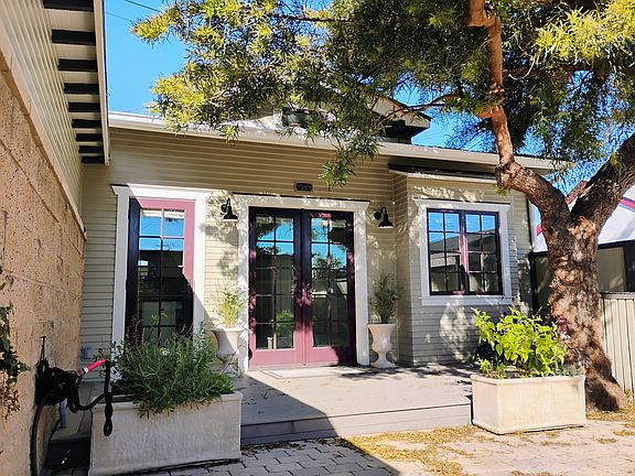 Kitchen and main entry French doors, bay window, patio