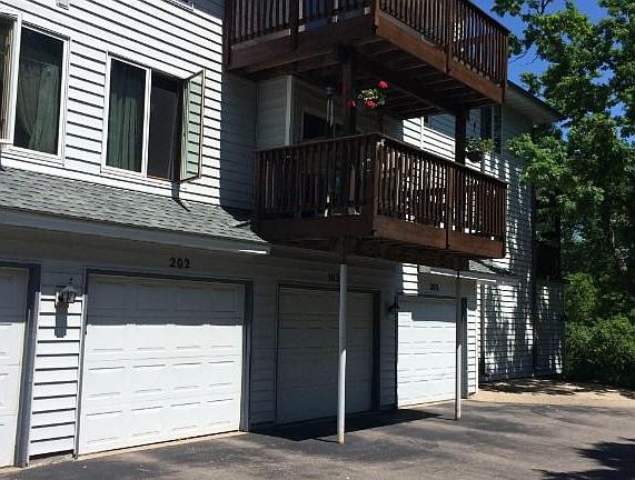 Upper level with nice sized deck. Attached garages and elevator in building.