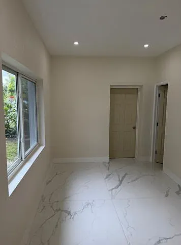 6410 NW Miami Ct — Photo 10