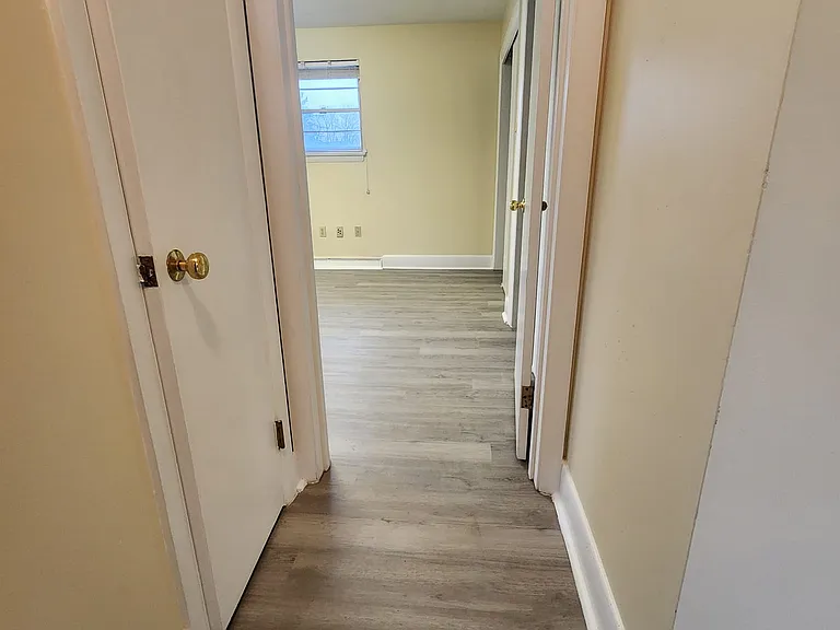 Hall way to master bed room, bed room # 02, coat closet, broom closet, and bathroom