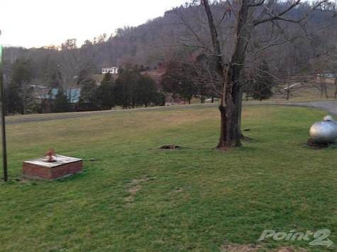 Long winding blacktop driveway!