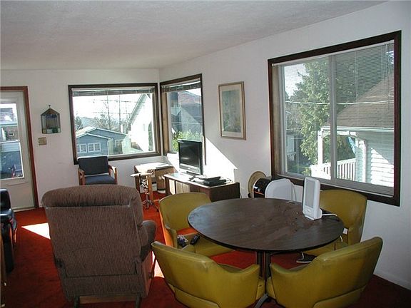 Living and Dining... Most of the Windows Have Been Replaced.