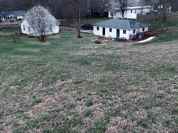 View of garage and house