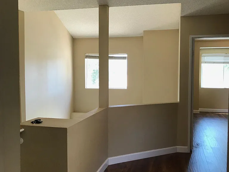 Hallway overlook high vaulted ceiling