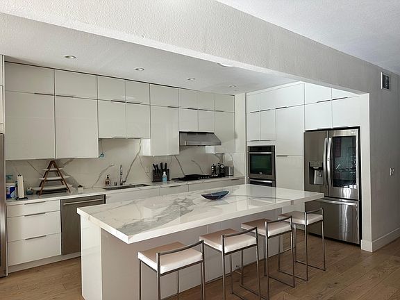 Thermador Gas Stove, separate wine fridge, Bosch dishwasher, LG refrigerator.