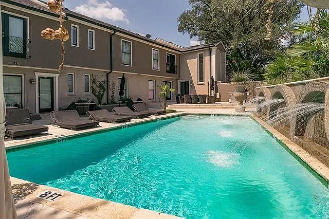 Pool with fountains from gazebo. My unit is back by the table.
