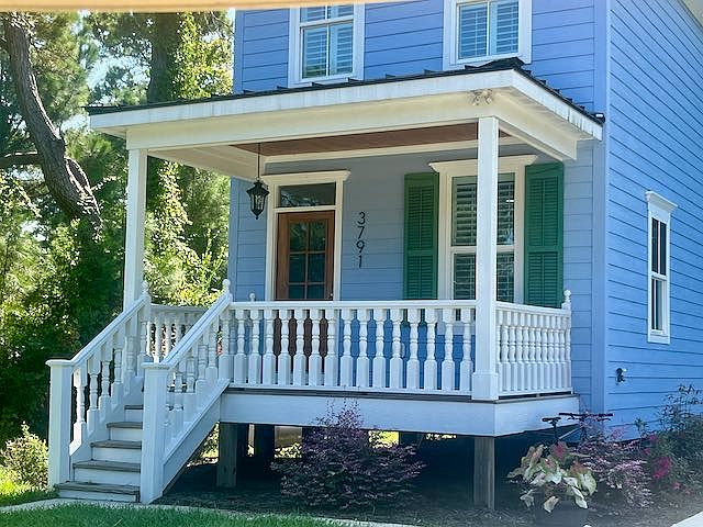 Front porch with plenty of room for rocking chairs