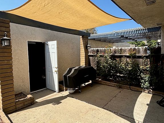 Enjoy friends and family in the covered, private patio.