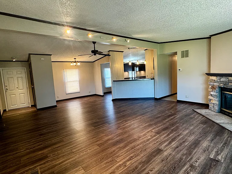 Grate room facing Fireplace and bar