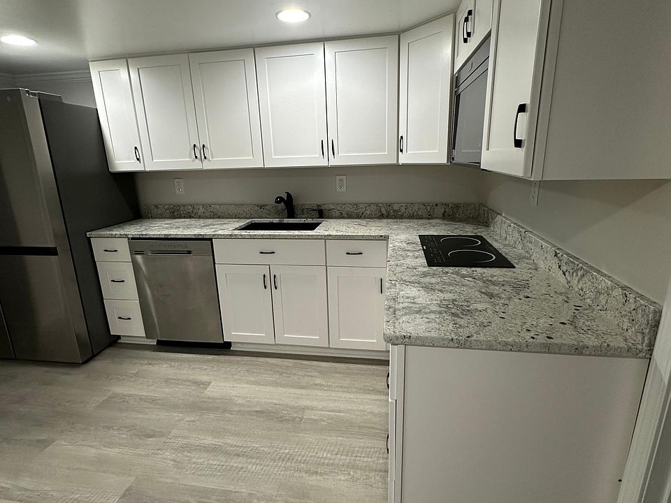 Newly renovated kitchen. Stainless steel appliances, large (27 cu ft) side by side refrigerator/freezer with craft ice, external ice and water dispenser. New cabinets, pantry and new waterproof vinyl flooring and granite countertops.