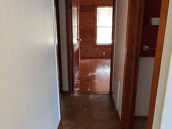 hallway from living room to back of house