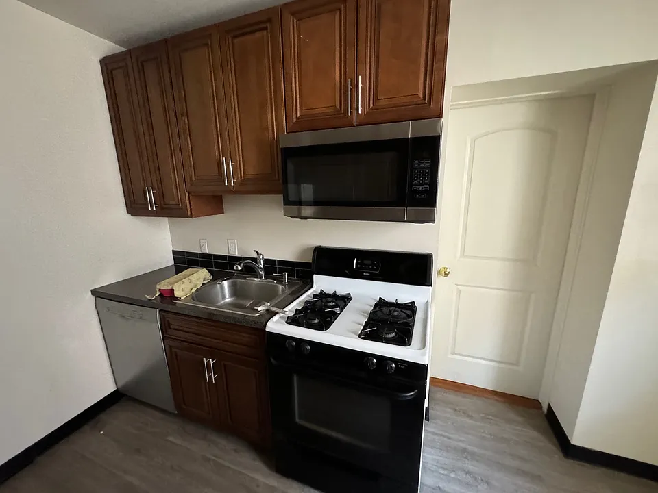 kitchen with bedroom door to right