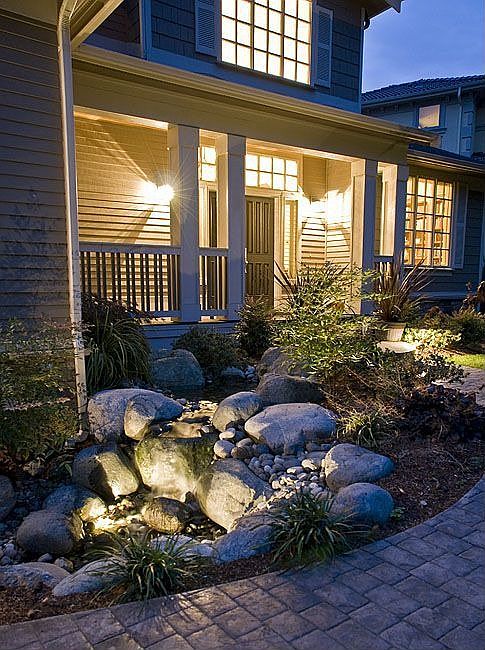 Welcome home!  Walk past a tranquil waterfall as you enter your beautiful home