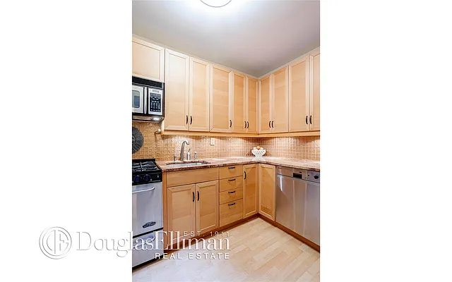 Sold by Douglas Elliman | media 11