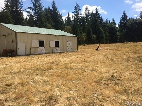 The barn is 40x48 has 3 stalls, tack room and hay and grain room.