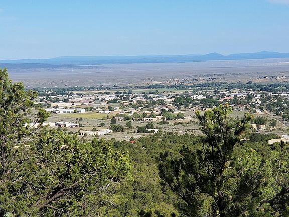 hiking from the front door overlooking town of taos.