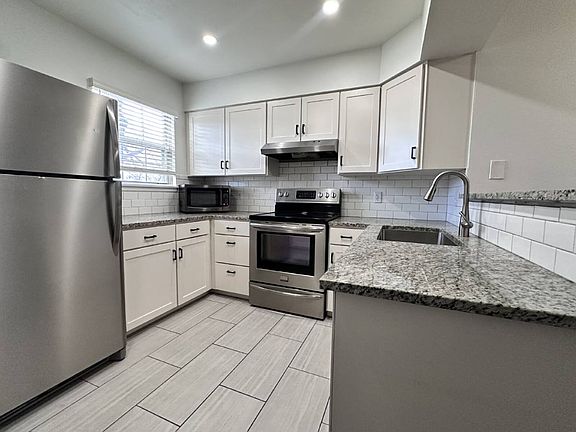 2nd image of 9559 W Coal Mine Ave APT B