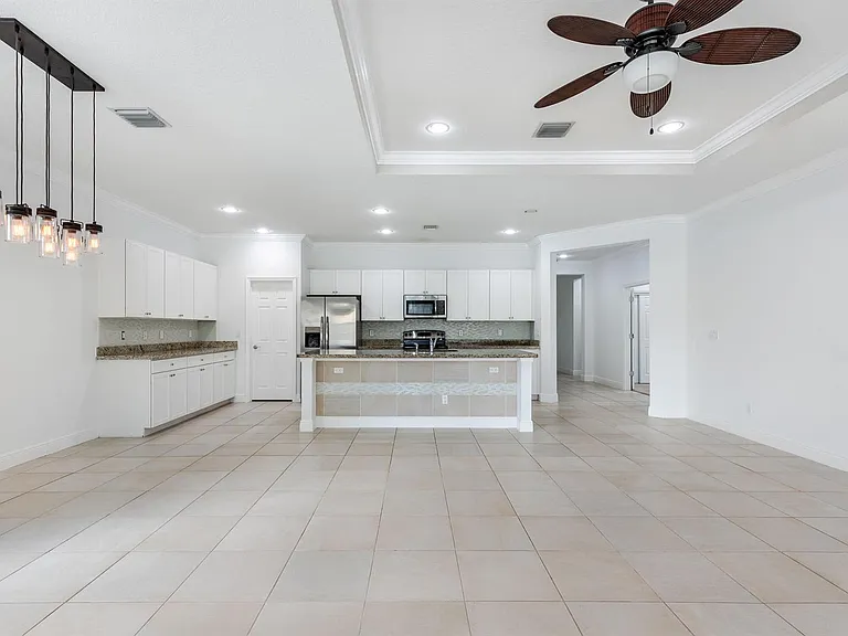 1367 NW Leonardo Cir — Photo 25