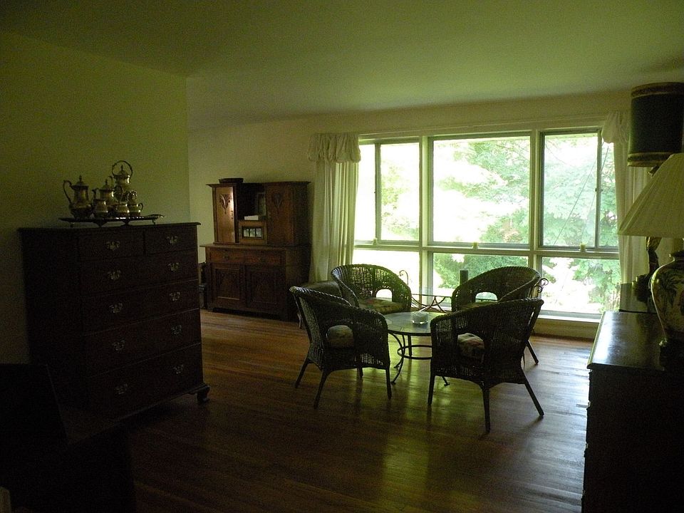Wall of windows across the back of the spacious living room