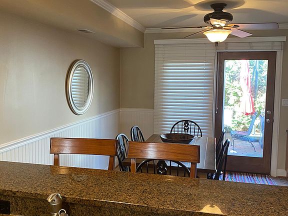 Kitchen Area with Door to Patio.