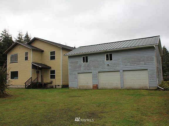 View of the 3 bay garage, 864sqft rec room, 2nd residence 3,430 sq ft unfinished