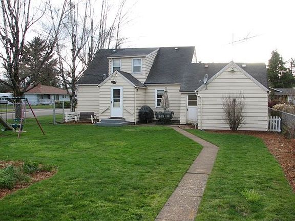 Back yard facing back of house