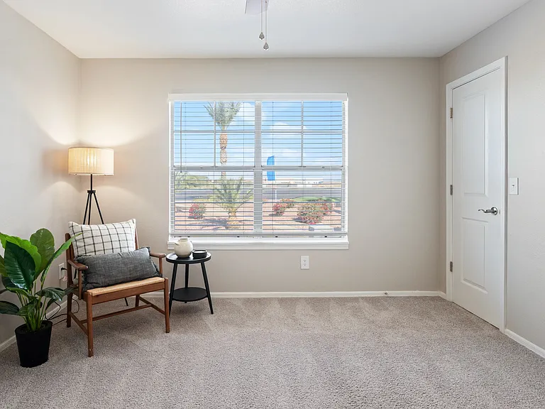 Enjoy natural light and a spacious layout in this inviting bedroom, designed for comfort and relaxation at Sedona Peaks.