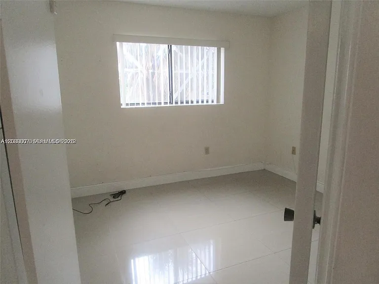 9491 Palm Cir S #205 — Photo 15