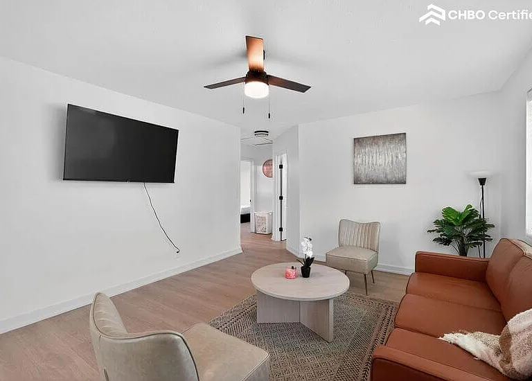 Neutral decor, warm lighting, and an open layout