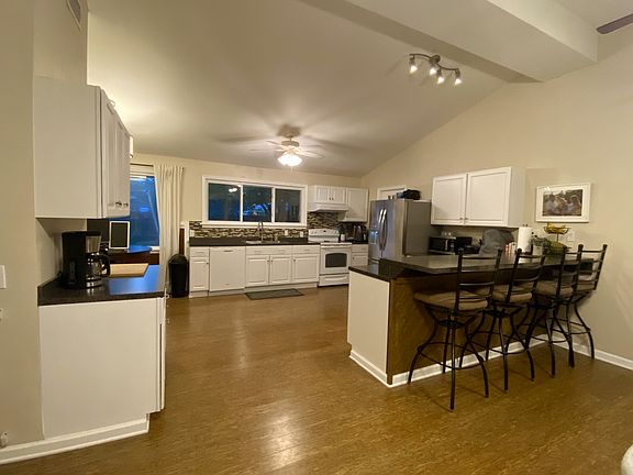 Walk in front door to this view of living/kitchen area