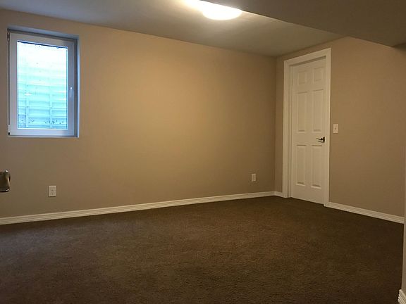 Master bedroom and door to bonus storage closet (curtain to be installed)