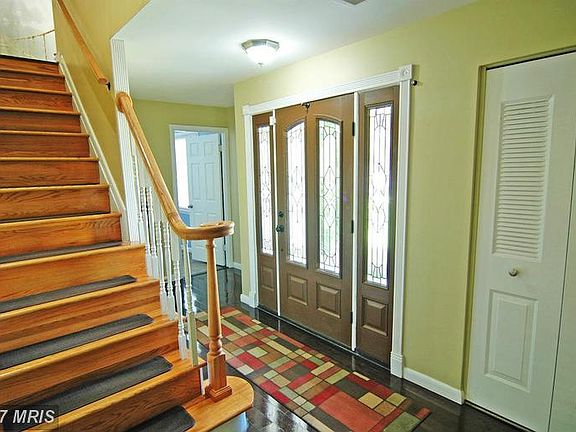 FOYER with HARDWOOD FLOORS
