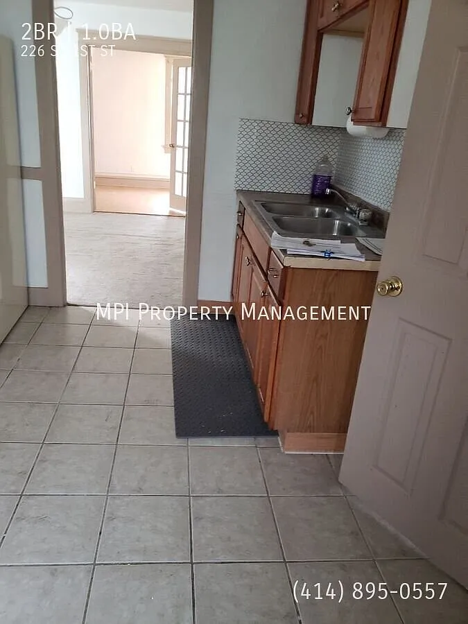 226 S. 61st Street, Milwaukee - 2 BR Upper 1/2 off first months rent! — Photo 2