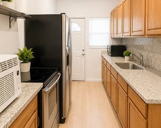 4th image of 410 S Ocean Breeze St #2