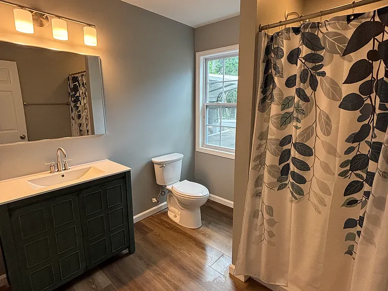 Spacious second bathroom with walk-in shower