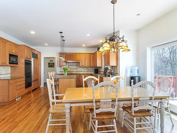 Gracious dining room with bay window