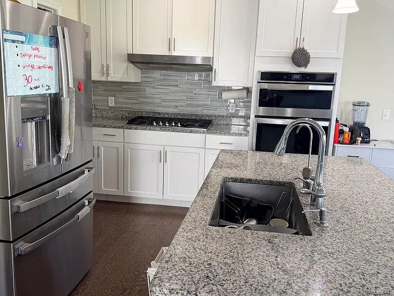 Kitchen with backsplash tile