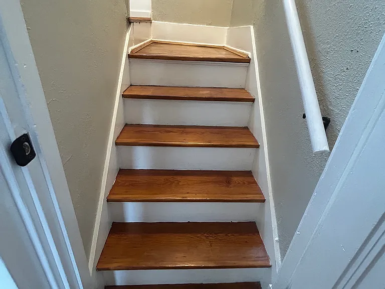 Stairs to second floor and second bedroom