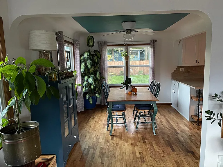 Coved plaster ceilings and restored hardwood floors.