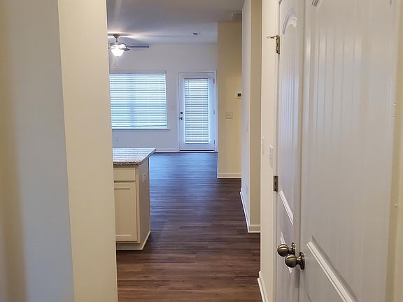 Entrance:

1 Bedroom located to the left.
Washer & Dryer closet to the right.