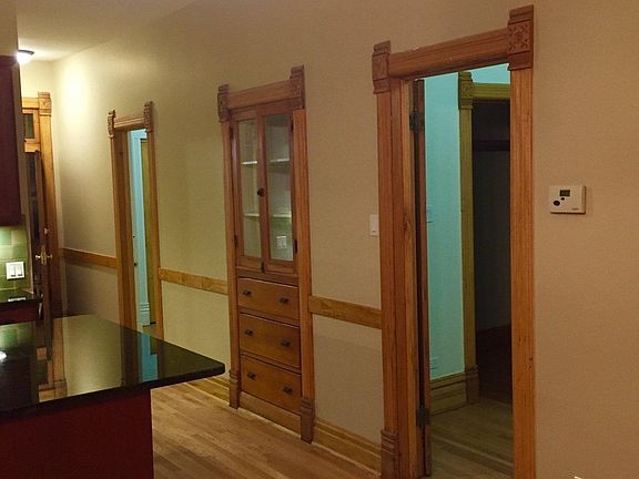 Kitchen hutch plus doorways to Bedrooms 3 & 2