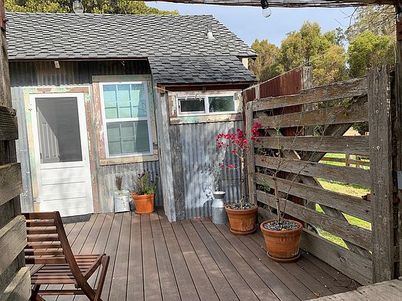 Front porch seating and entry into the Milk house