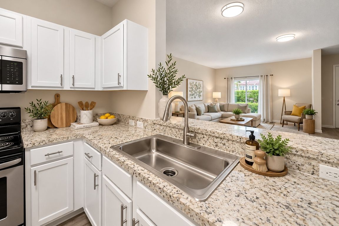 Elevate your lifestyle at Delray Bay with this beautifully designed kitchen featuring modern finishes and a spacious layout. Enjoy culinary delights in a bright, inviting space. Explore your future home today!