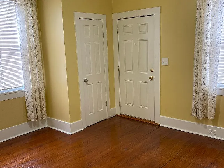 Bedroom 1 with closet and exterior exit