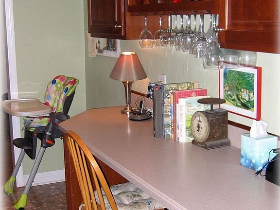 Kitchen has lots of counter space & wine storage