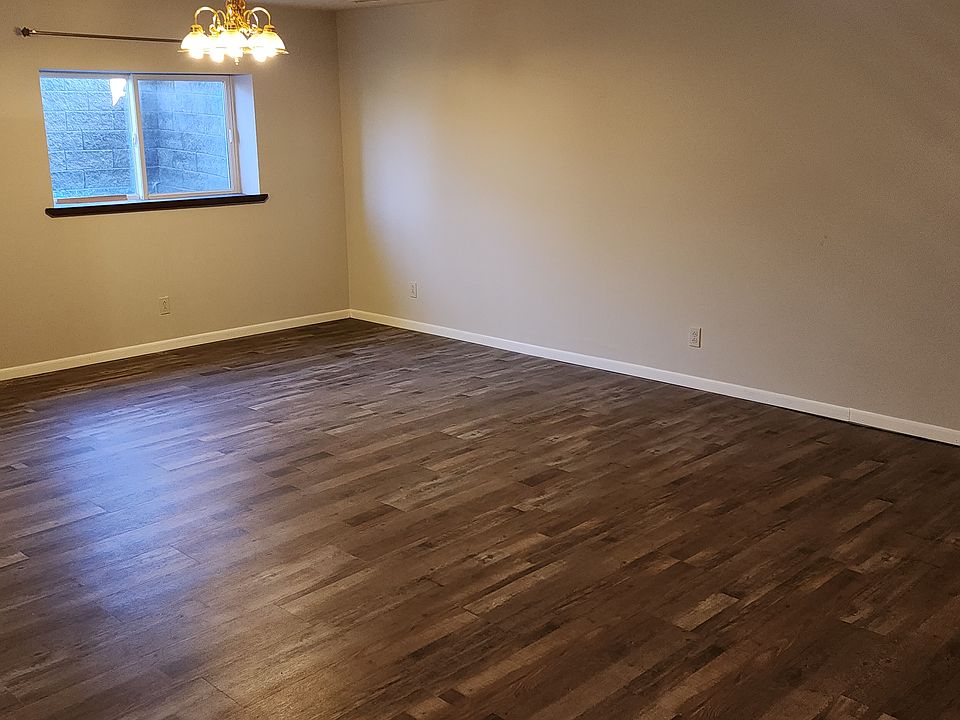 open concept kitchen, dining, and living room. Great for guests and furniture.