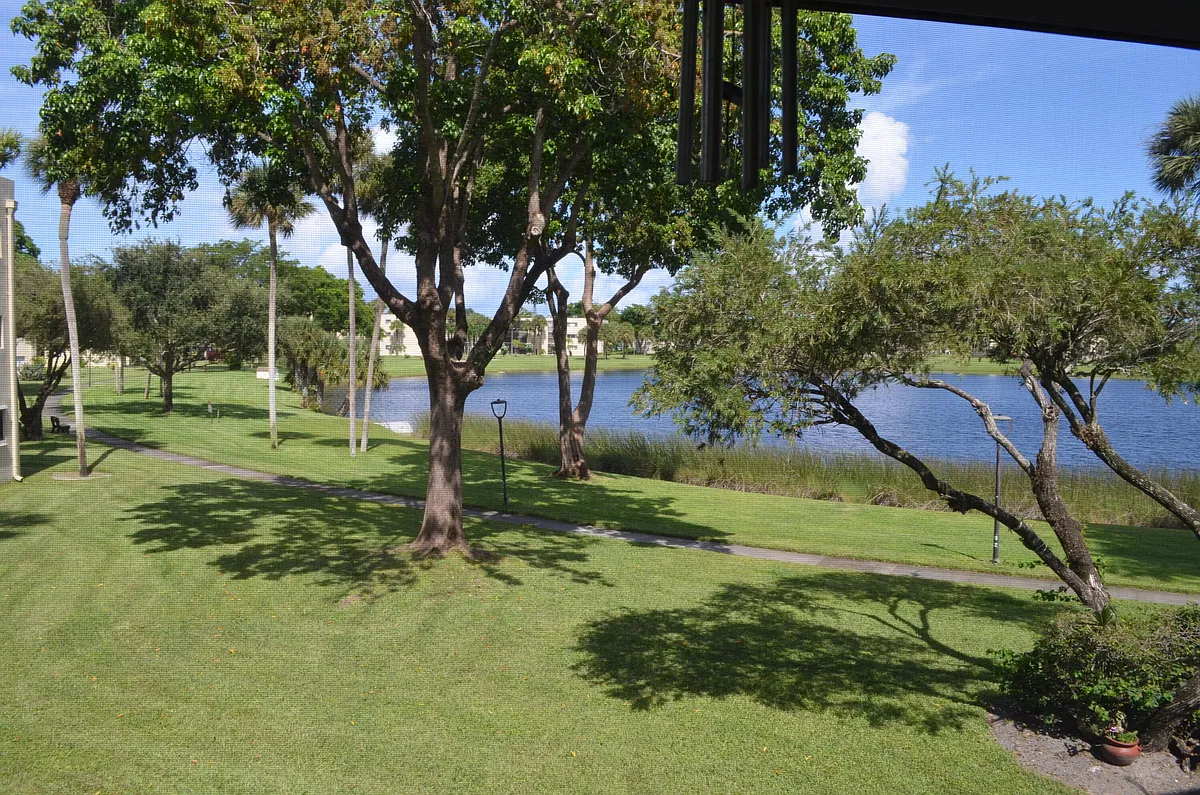 Photo 2 of 50 - 5220 Las Verdes Cir #211 - Delray Beach, FL Building Photo - 5220 Las Verdes Cir #211