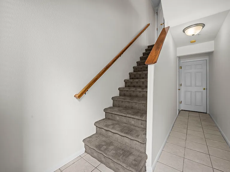 1st floor main entry foyer to garage and upstairs to primary (2nd floor)