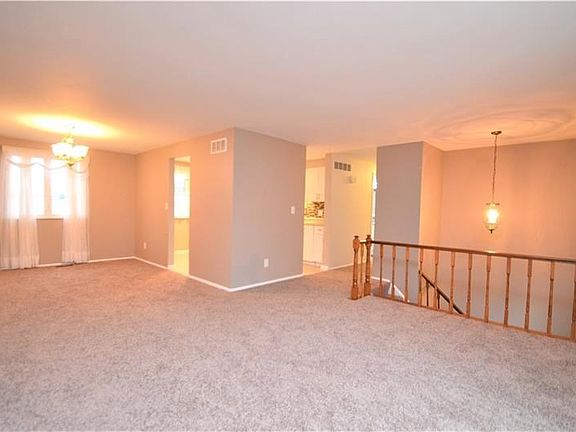 Living-room with ALL NEW Paint and Carpet.