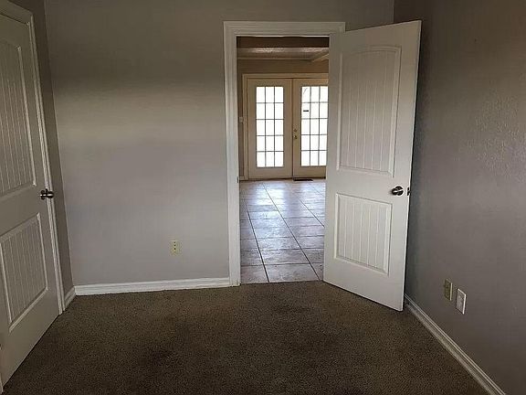 Bedroom with large closet locate near garage can be used as a quite office or bedroom.
